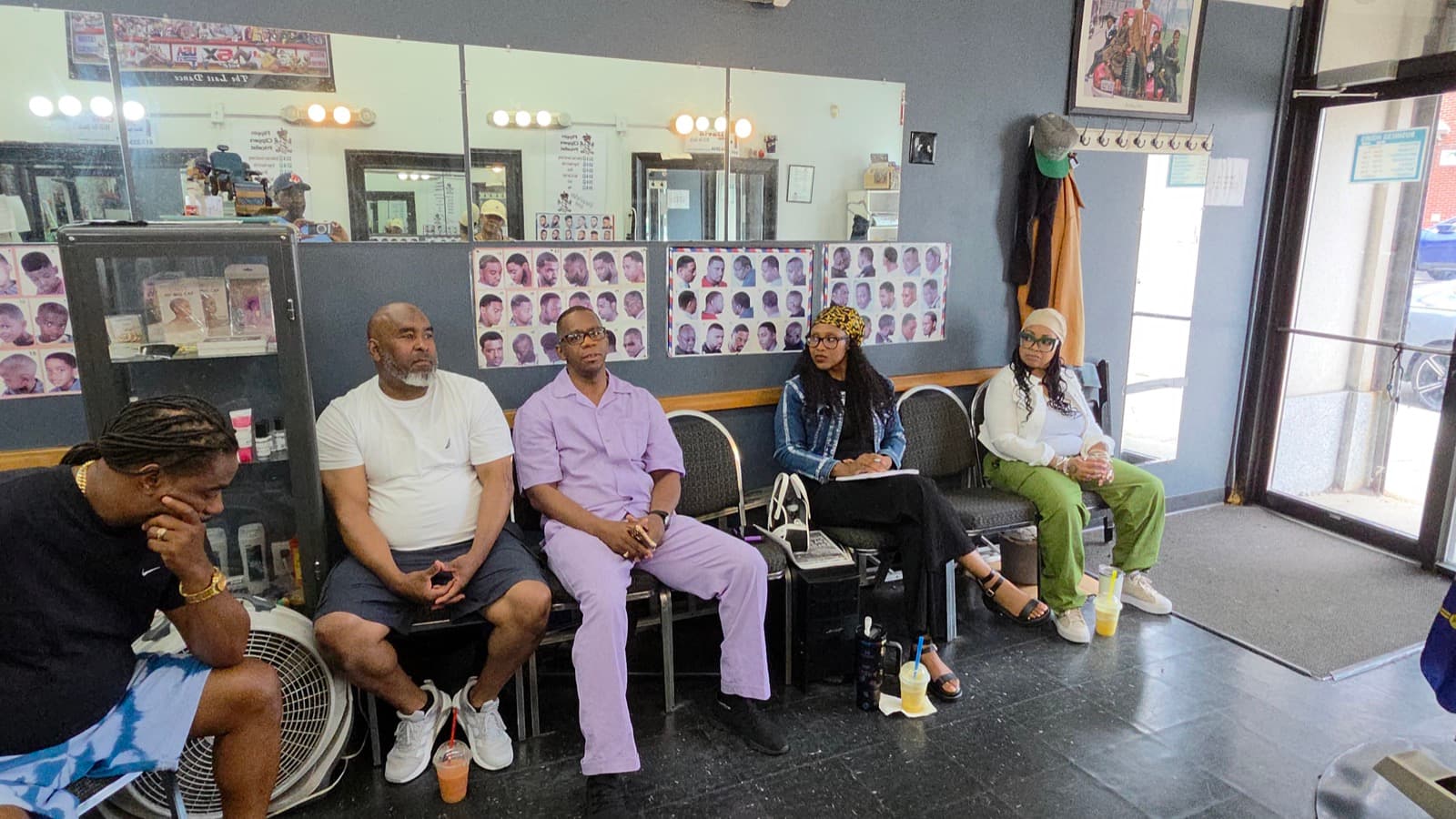 The Session Four circle inside Flipping Clippers Barbershop in Dorchester — the final Chair Conversation. Tyshaun Perryman, Insightful Recovery Solutions.
